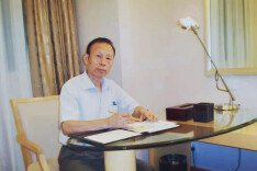 长沙理工大学老党员覃先美：“译”心向党