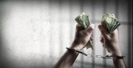 利令智昏越雷池 锒铛入狱悔恨迟