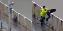 惊险！男子桥边痛哭欲轻生 跳桥瞬间被交警一把拽住