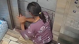 聋哑老人第一次独自乘坐电梯被困 消防电梯井搭梯救援