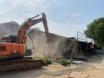 石井镇有序开展过渡棚拆除工作