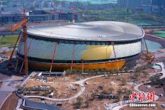 杭州75岁老人用照片记录亚运场馆“成长史”