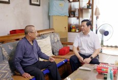 走访连真情 省国动办开展慰问退休老同志活动