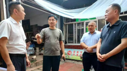 县委书记覃歇民调研城区农贸市场工作