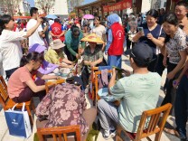 我们的节日｜“包粽子，庆端午”主题党建活动乐了团洲村民