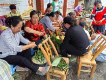 花垣县兴农园社区：广电助力兴农园 端午粽香心相连