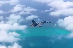 中国人民解放军南部战区位黄岩岛领海领空及周边区域组织战备警巡