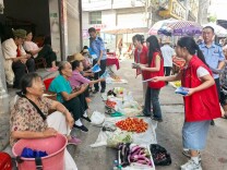 永顺县青坪镇开展大学生“送法下乡”普法宣传活动