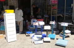 长沙查处一作弊秤非法改装窝点，现场收缴450套作弊遥控器