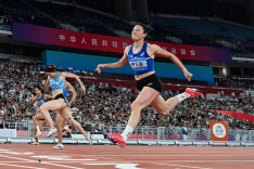 韦永丽：10秒99女“飞人” 难说告别