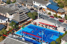New Basketball Court Enriches Life of Dong Villagers