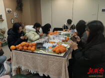 南华大学：彩绘“橙”意贺新岁