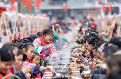 People Greet Upcoming Spring Festival in Their New Home