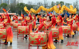 People Greet Chinese New Year with Drum Performance