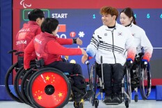 中国队夺得冬残奥会历史首枚轮椅冰壶混双金牌