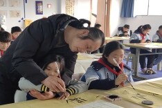 安乡县围庵小学：翰墨润童心 书法传经典