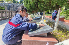 擦拭丰碑寄哀思 书写英名承精神