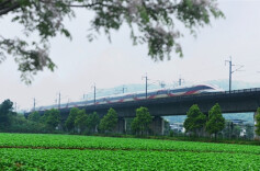 Bullet Train Runs Through Picturesque Countryside