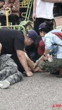 骑行者摔倒在地不能动弹，休假护师上演“教科书式”救护丨26℃