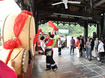 Tourists Enchanted by Miao Ethnic Culture in Guzhang County