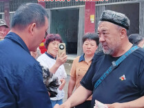 告别石门 转战重庆 全国道德模范阿里木将买牛剩下的钱捐给受灾群众