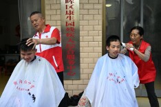 十二年义剪暖残障 衡阳老夫妻用爱心守护特殊群体