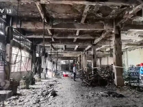 栅栏阻挡逃生、多次被要求整改 记者探访福建鞋厂火灾现场