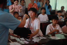 锦岩村里的青春微光：大学生“防非”志愿团为乡村“一老一小”筑起金融防护墙