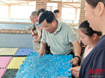 蓝山石蛙养殖户：教授上门 增收有底