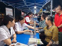 省疾病防控科普宣传暨家庭健康夜市活动在潭启幕