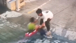 男童滑板失控瞬间 17岁少年飞扑救下