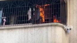 广州大哥扛消防水枪爬窗救火 谢谢挺身而出的平凡英雄！