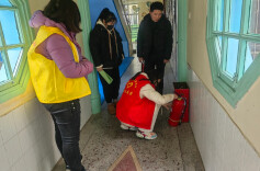学雷锋进网格 志愿服务护安全