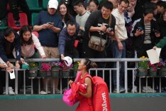 郑钦文：代表国家是荣誉 保持百分百专注