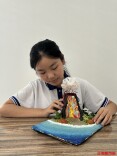 她用辣椒白菜搭出立体火山，初一女生的地理模型“有味道”
