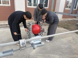 这支团队研发智能机器人助力电力运维高空作业