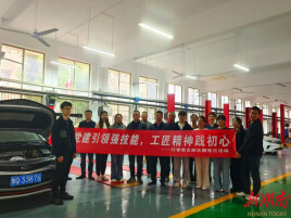 上来就练手！湖南兵器工业高级技工学校的主题党日活动，让党员在换轮胎中践行“工匠初心”