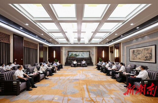 张庆伟会见王传福一行