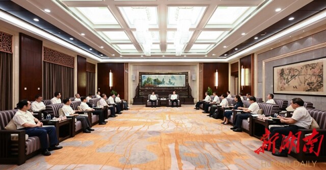 张庆伟会见吴燕生一行