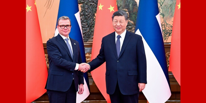 习近平会见芬兰总理奥尔波