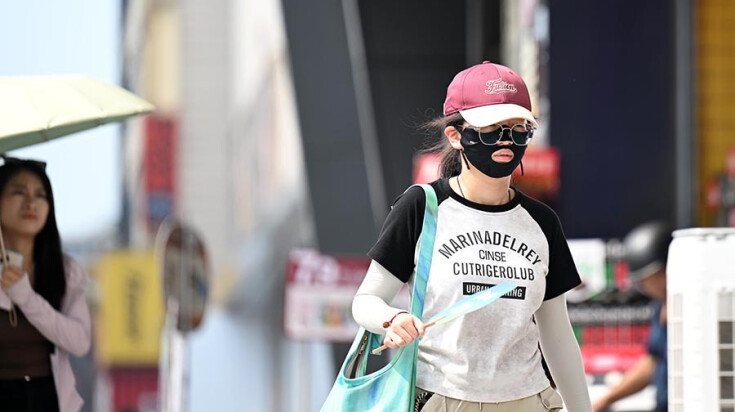 长沙开启高温模式 市民防晒各显神通
